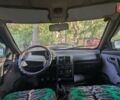 Зеленый ВАЗ 2111, объемом двигателя 1.5 л и пробегом 212 тыс. км за 1800 $, фото 4 на Automoto.ua
