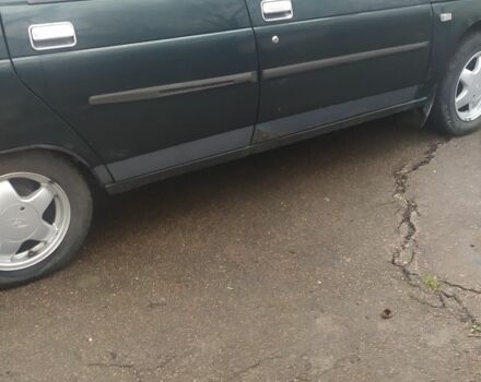 Зелений ВАЗ 2111, об'ємом двигуна 1 л та пробігом 279 тис. км за 1300 $, фото 3 на Automoto.ua