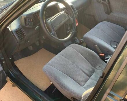 Зеленый ВАЗ 2111, объемом двигателя 1.5 л и пробегом 215 тыс. км за 1582 $, фото 4 на Automoto.ua