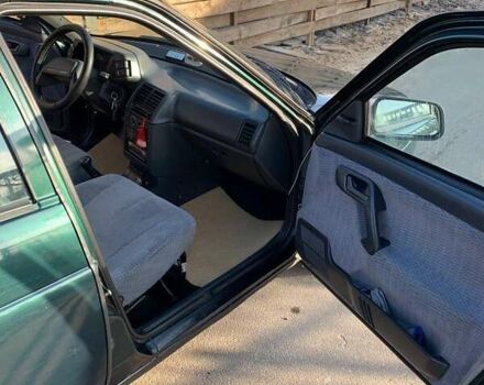 Зеленый ВАЗ 2111, объемом двигателя 1.5 л и пробегом 215 тыс. км за 1582 $, фото 1 на Automoto.ua