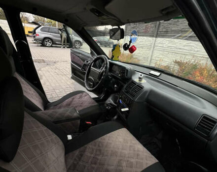 Зеленый ВАЗ 2111, объемом двигателя 1.5 л и пробегом 250 тыс. км за 1900 $, фото 4 на Automoto.ua