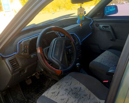 Зеленый ВАЗ 2111, объемом двигателя 1.6 л и пробегом 234 тыс. км за 1250 $, фото 4 на Automoto.ua