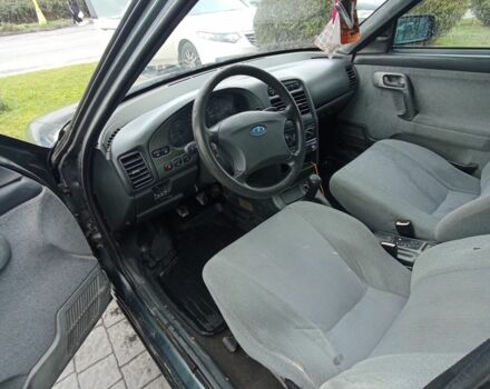 Зеленый ВАЗ 2111, объемом двигателя 1.6 л и пробегом 137 тыс. км за 1550 $, фото 7 на Automoto.ua