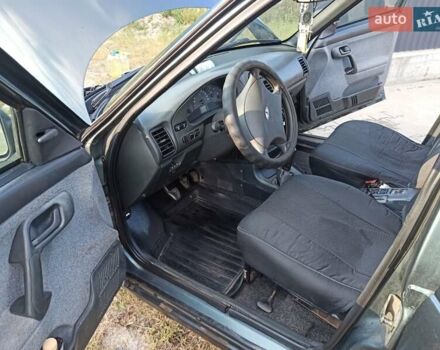 Зелений ВАЗ 2111, об'ємом двигуна 1.6 л та пробігом 274 тис. км за 2000 $, фото 4 на Automoto.ua