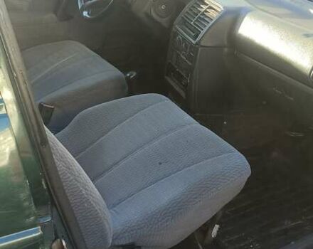 Зеленый ВАЗ 2111, объемом двигателя 1.5 л и пробегом 250 тыс. км за 1000 $, фото 1 на Automoto.ua