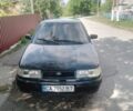 Черный ВАЗ 2112, объемом двигателя 1.6 л и пробегом 300 тыс. км за 1000 $, фото 1 на Automoto.ua