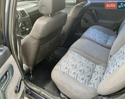 Чорний ВАЗ 2112, об'ємом двигуна 1.6 л та пробігом 250 тис. км за 1999 $, фото 8 на Automoto.ua