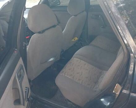 Черный ВАЗ 2112, объемом двигателя 1.6 л и пробегом 181 тыс. км за 1750 $, фото 5 на Automoto.ua