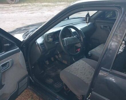 Черный ВАЗ 2112, объемом двигателя 1.6 л и пробегом 181 тыс. км за 1750 $, фото 4 на Automoto.ua