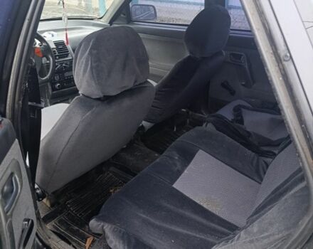 Черный ВАЗ 2112, объемом двигателя 1.6 л и пробегом 300 тыс. км за 800 $, фото 5 на Automoto.ua