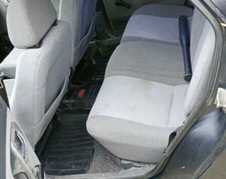 Черный ВАЗ 2112, объемом двигателя 1.6 л и пробегом 330 тыс. км за 1200 $, фото 13 на Automoto.ua