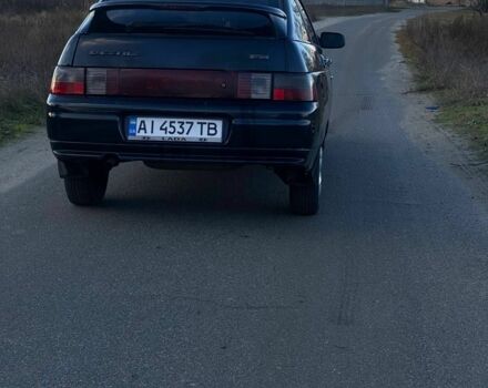Черный ВАЗ 2112, объемом двигателя 1.6 л и пробегом 166 тыс. км за 2300 $, фото 4 на Automoto.ua