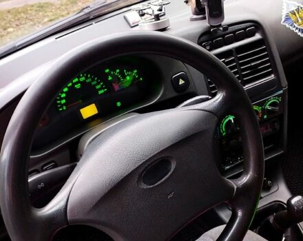 Чорний ВАЗ 2112, об'ємом двигуна 1.6 л та пробігом 170 тис. км за 2000 $, фото 4 на Automoto.ua