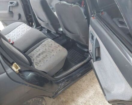 Черный ВАЗ 2112, объемом двигателя 1.6 л и пробегом 210 тыс. км за 1250 $, фото 4 на Automoto.ua