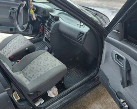 Черный ВАЗ 2112, объемом двигателя 1.6 л и пробегом 210 тыс. км за 1250 $, фото 7 на Automoto.ua