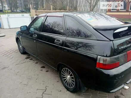 Черный ВАЗ 2112, объемом двигателя 1.62 л и пробегом 200 тыс. км за 3100 $, фото 1 на Automoto.ua