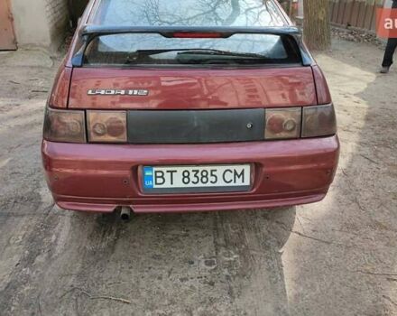 Красный ВАЗ 2112, объемом двигателя 1.5 л и пробегом 340 тыс. км за 2099 $, фото 6 на Automoto.ua