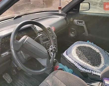 Красный ВАЗ 2112, объемом двигателя 1.5 л и пробегом 340 тыс. км за 2099 $, фото 10 на Automoto.ua