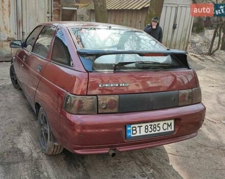 Красный ВАЗ 2112, объемом двигателя 1.5 л и пробегом 340 тыс. км за 2099 $, фото 8 на Automoto.ua