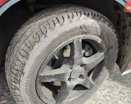 Красный ВАЗ 2112, объемом двигателя 1.5 л и пробегом 340 тыс. км за 2099 $, фото 15 на Automoto.ua