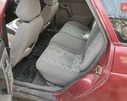 Красный ВАЗ 2112, объемом двигателя 1.5 л и пробегом 340 тыс. км за 2099 $, фото 12 на Automoto.ua