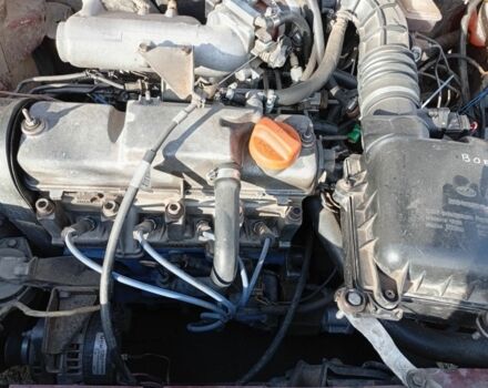 Красный ВАЗ 2112, объемом двигателя 1.5 л и пробегом 336 тыс. км за 1200 $, фото 1 на Automoto.ua