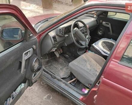 Красный ВАЗ 2112, объемом двигателя 1.5 л и пробегом 340 тыс. км за 2099 $, фото 9 на Automoto.ua