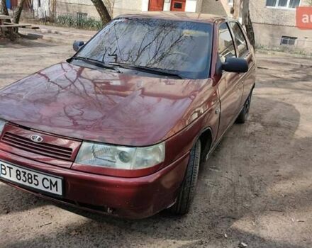 Красный ВАЗ 2112, объемом двигателя 1.5 л и пробегом 340 тыс. км за 2099 $, фото 1 на Automoto.ua