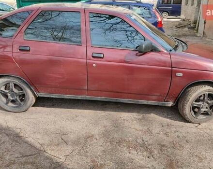 Красный ВАЗ 2112, объемом двигателя 1.5 л и пробегом 340 тыс. км за 2099 $, фото 4 на Automoto.ua