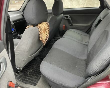 Красный ВАЗ 2112, объемом двигателя 1.6 л и пробегом 158 тыс. км за 1950 $, фото 6 на Automoto.ua