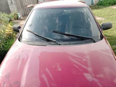 Красный ВАЗ 2112, объемом двигателя 1.6 л и пробегом 195 тыс. км за 1188 $, фото 1 на Automoto.ua