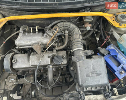 Серый ВАЗ 2112, объемом двигателя 1.5 л и пробегом 227 тыс. км за 550 $, фото 6 на Automoto.ua