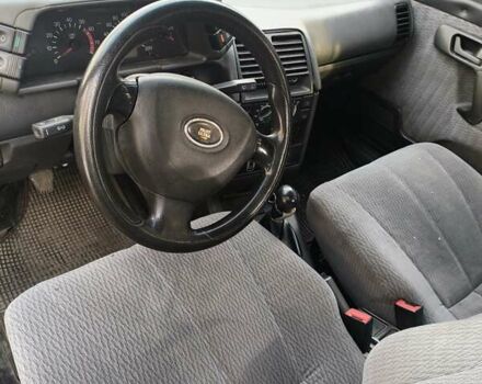 Серый ВАЗ 2112, объемом двигателя 1.5 л и пробегом 226 тыс. км за 1100 $, фото 9 на Automoto.ua