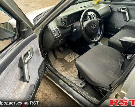 Серый ВАЗ 2112, объемом двигателя 15 л и пробегом 205 тыс. км за 1700 $, фото 4 на Automoto.ua