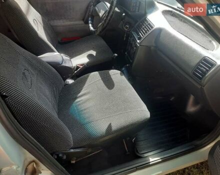 Серый ВАЗ 2112, объемом двигателя 1.5 л и пробегом 266 тыс. км за 3500 $, фото 14 на Automoto.ua