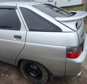 Серый ВАЗ 2112, объемом двигателя 1.5 л и пробегом 350 тыс. км за 1900 $, фото 12 на Automoto.ua