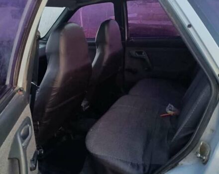 Серый ВАЗ 2112, объемом двигателя 1.5 л и пробегом 261 тыс. км за 2300 $, фото 3 на Automoto.ua