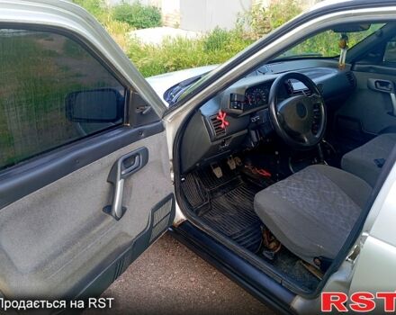 Серый ВАЗ 2112, объемом двигателя 1.6 л и пробегом 217 тыс. км за 1800 $, фото 3 на Automoto.ua