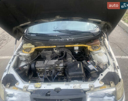 Серый ВАЗ 2112, объемом двигателя 1.6 л и пробегом 265 тыс. км за 1800 $, фото 4 на Automoto.ua