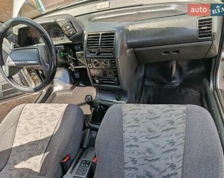 Сірий ВАЗ 2112, об'ємом двигуна 1.6 л та пробігом 185 тис. км за 1999 $, фото 18 на Automoto.ua