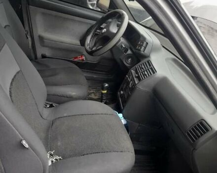 Серый ВАЗ 2112, объемом двигателя 1.6 л и пробегом 247 тыс. км за 1585 $, фото 3 на Automoto.ua