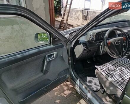 Сірий ВАЗ 2112, об'ємом двигуна 1.6 л та пробігом 321 тис. км за 2050 $, фото 5 на Automoto.ua