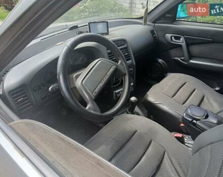 Серый ВАЗ 2112, объемом двигателя 1.6 л и пробегом 210 тыс. км за 2000 $, фото 2 на Automoto.ua