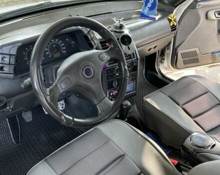 Серый ВАЗ 2112, объемом двигателя 1.6 л и пробегом 280 тыс. км за 1599 $, фото 4 на Automoto.ua