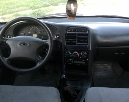 Сірий ВАЗ 2112, об'ємом двигуна 1.6 л та пробігом 233 тис. км за 1900 $, фото 4 на Automoto.ua