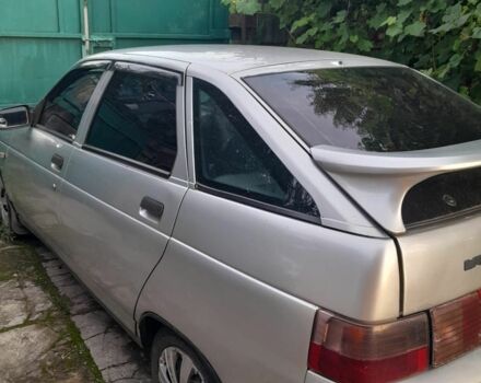 Серый ВАЗ 2112, объемом двигателя 1 л и пробегом 338 тыс. км за 1550 $, фото 1 на Automoto.ua