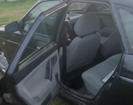 Серый ВАЗ 2112, объемом двигателя 1.6 л и пробегом 220 тыс. км за 2000 $, фото 4 на Automoto.ua