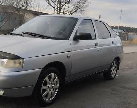 Серый ВАЗ 2112, объемом двигателя 1.6 л и пробегом 223 тыс. км за 2099 $, фото 1 на Automoto.ua