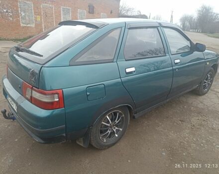 Зеленый ВАЗ 2112, объемом двигателя 1.5 л и пробегом 215 тыс. км за 1700 $, фото 4 на Automoto.ua