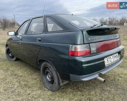 Зеленый ВАЗ 2112, объемом двигателя 1.5 л и пробегом 142 тыс. км за 1800 $, фото 3 на Automoto.ua